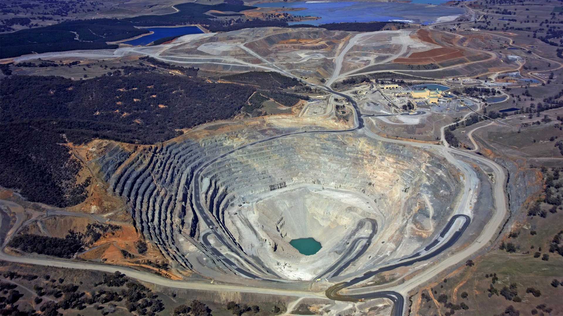 Aerial perspective of an open pit mine