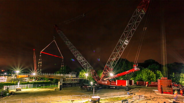 Wide view of cranes at work on a construction site